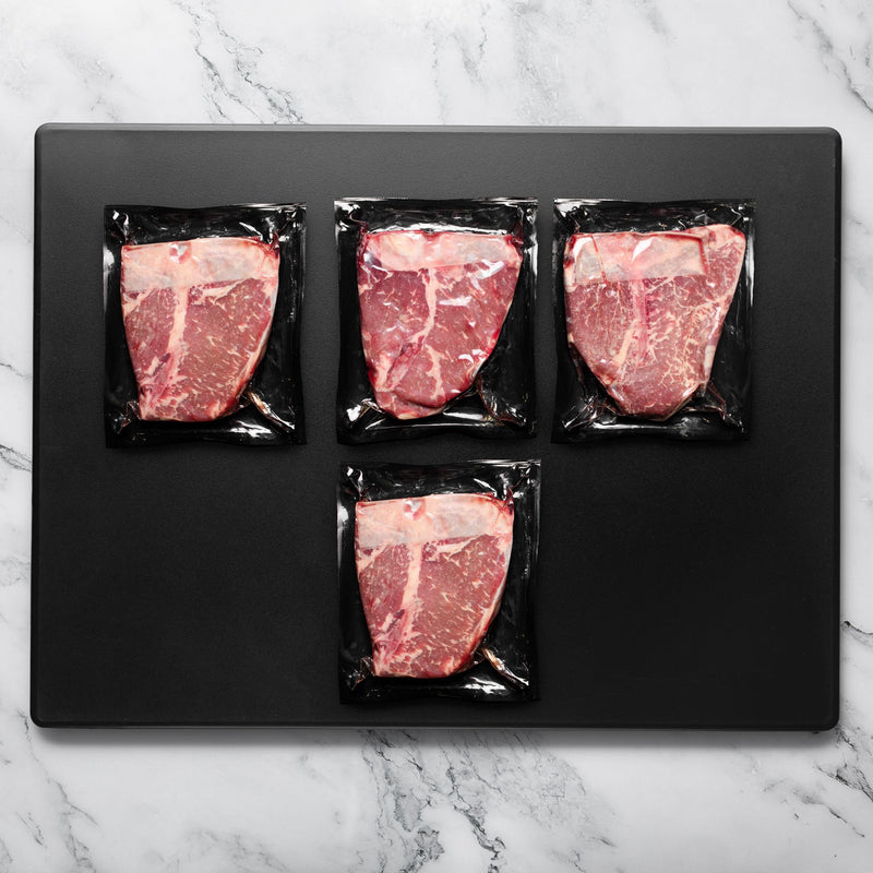 Rastelli's (4) 20 oz. Black Angus Porterhouse Steaks — View 3