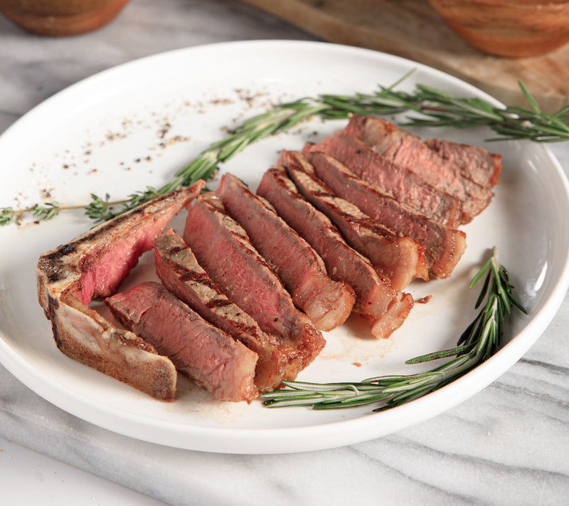 Rastelli's (4) 14 oz. USDA Prime Bone-In NY Strip Steaks — Main view